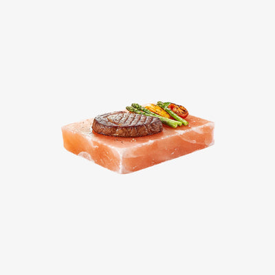 Himalayan salt cooking surface for grilling meats and vegetables